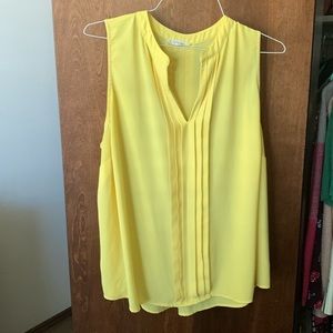 Yellow sleeveless blouse